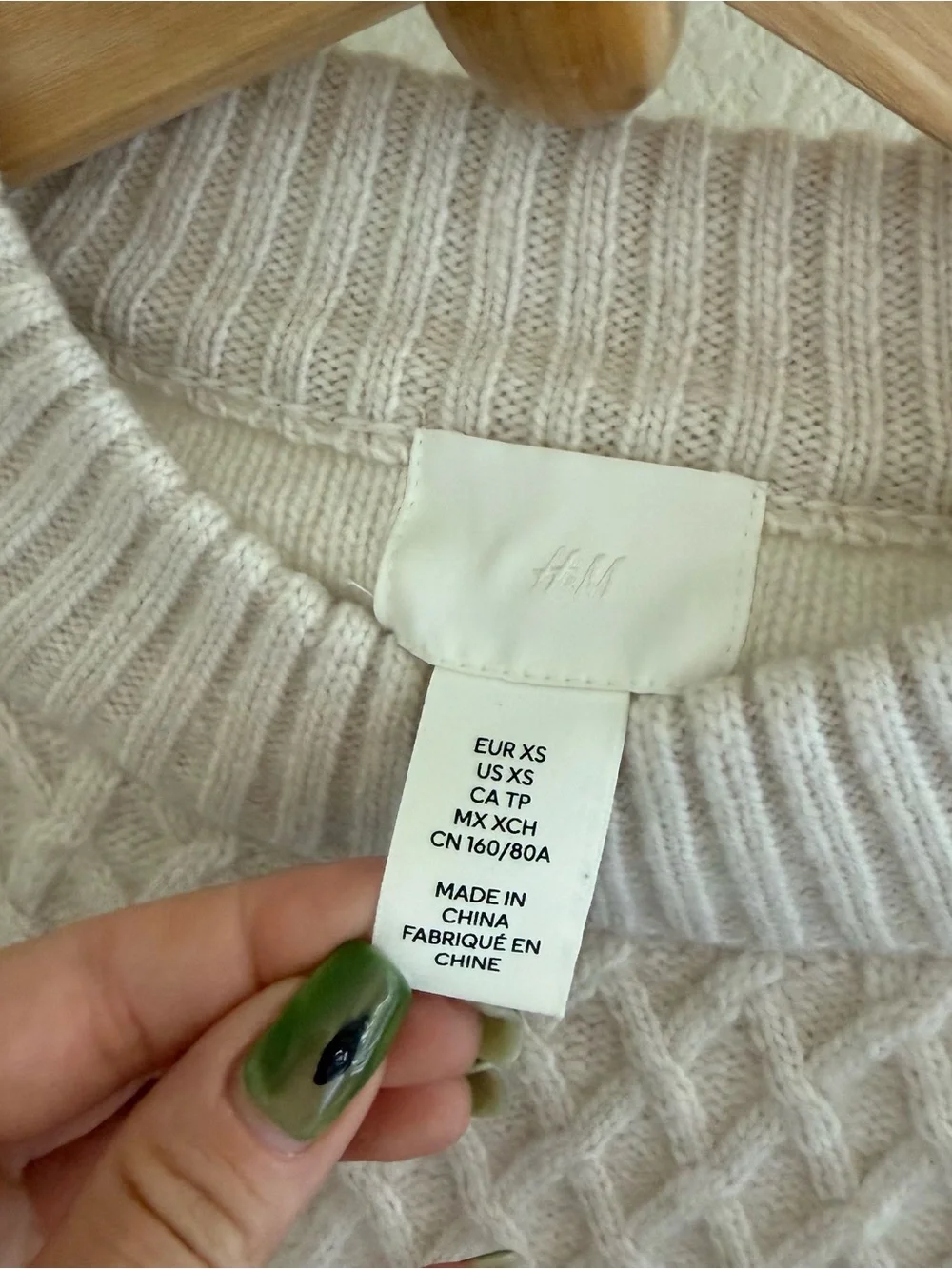 Clean girl capsule wardrobe minimalist preppy cream cable knit cropped sweater